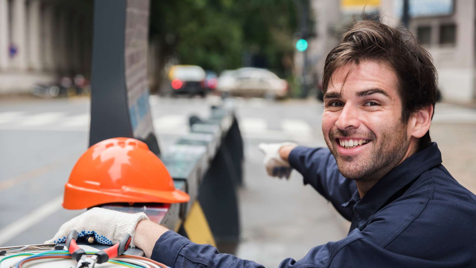male-electrician-equipment-street